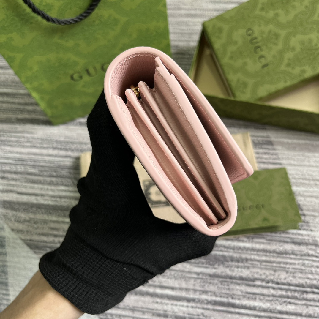 continental wallet with G*u*i script pink 7.5"w x 4"h x 1.4"d
